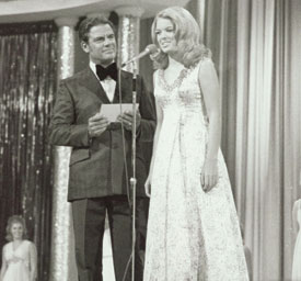 Longtime Miss America host Bert Parks ask a contestant a question