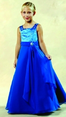 Model wearing a children's gown by Jacquelin Bridals