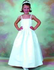 Model wearing a children's gown by The Perfect Pear