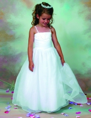 Model wearing a children's gown by The Perfect Pear